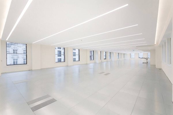 1-7 Future-ready office environment with wide floor area, secondary glazed windows for acoustic performance, and dynamic ceiling lighting for optimal illumination.